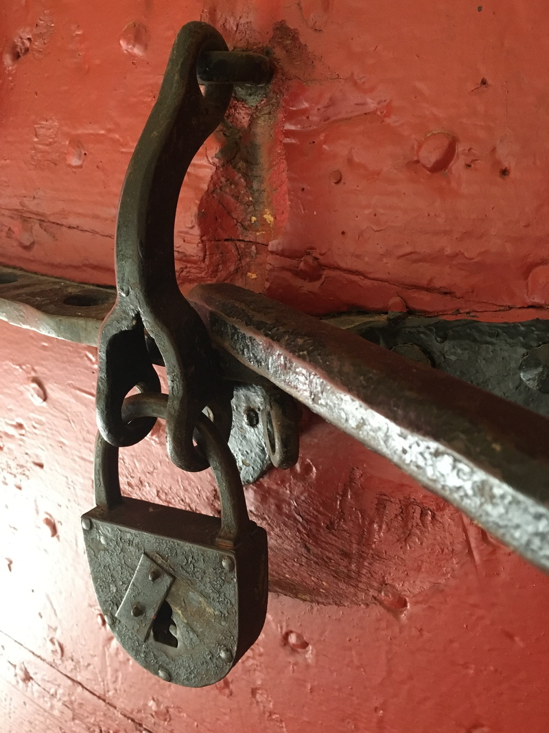low angle view, red, old, security, architecture, entrance, antiquity, iron, lock, no people, rusty, safety, day, weathered, rust, wood, deadbolt, metal
