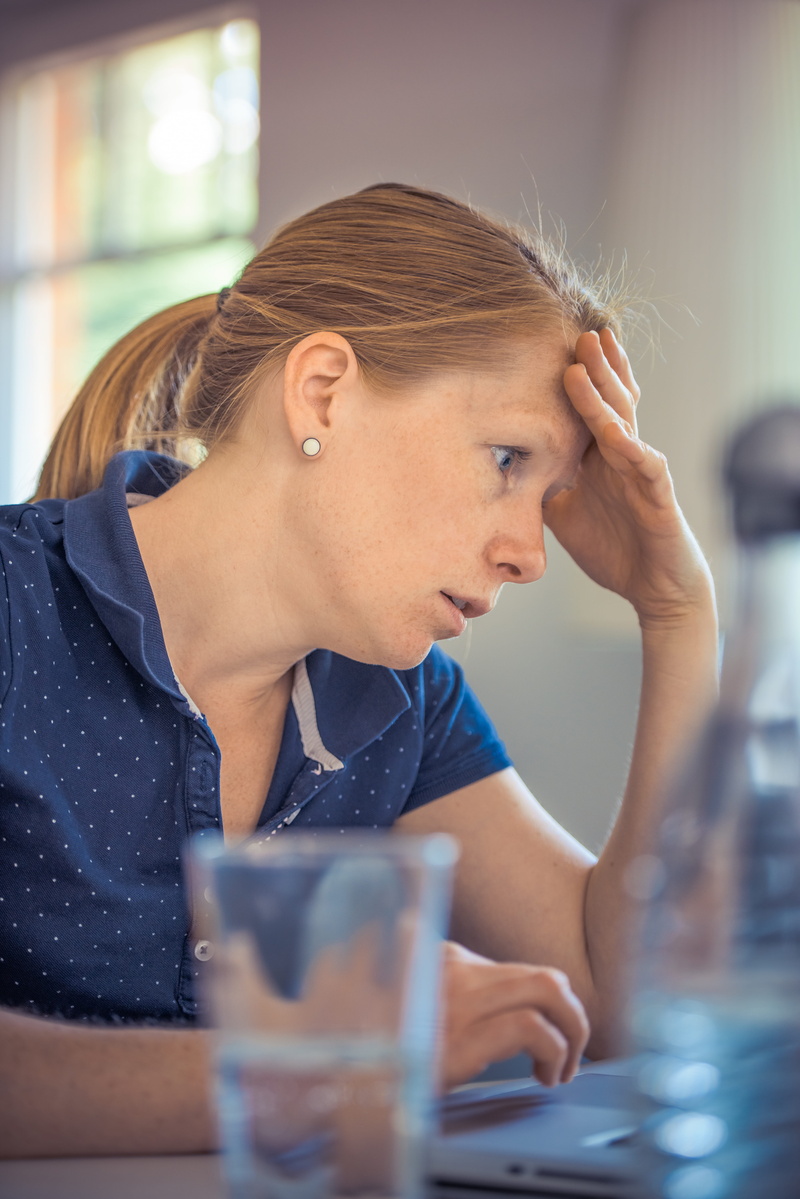 annoyed, one person, woman, headshot, stressed, real people, frustration, using, business, girl, lifestyles, frustrated, polo, selective focus, casual clothing
