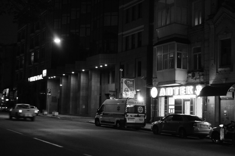 building exterior, illuminated, outdoors, lighting equipment, ambulance, motor vehicle, parked cars, kyiv, city, nightevening, building, mode of transportation