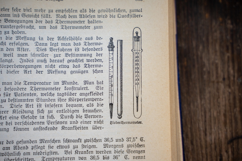 temperature, text, learn, religion, wood - material, book, fever thermometer, belief, book page, still life, thermometer, fever knife, close-up, flu, read