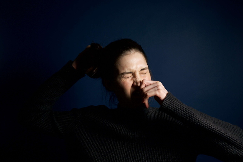 depression - sadness, sadness, studio, girl, hair, colored background, portrait, lighting, human body part, human face, black background, one person, emotional stress
