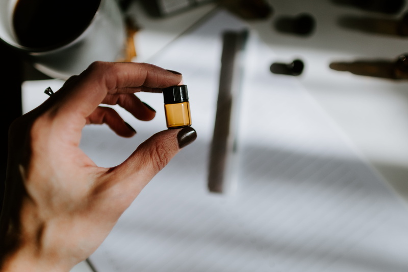 human hand, nail polish, brown, medication, holding, bright, hand, refreshment, drink, 5K, oily, finger, office, healthcare and medicine, jar, high angle view