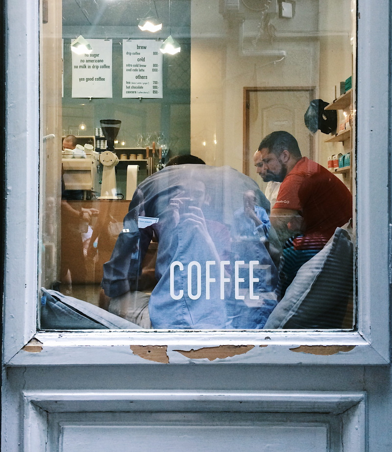 coffee, room, group, text, business, hungary, males, glass, door, communication, 2K, sofa, western script, window, transparent, two people, men, font