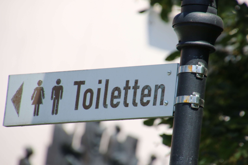 man and woman, message, toilets, close-up, sign, no people, capital letter, script, protection, instructions, non-western script, guidance, metal, focus on foreground