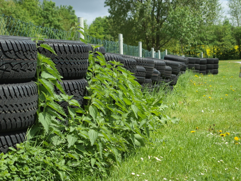 auto tires, field, nature, garbage, traffic, thrown away, pkw, auto, beauty in nature, environment, grass, day, sunlight, mature, green, seat, land, tranquility