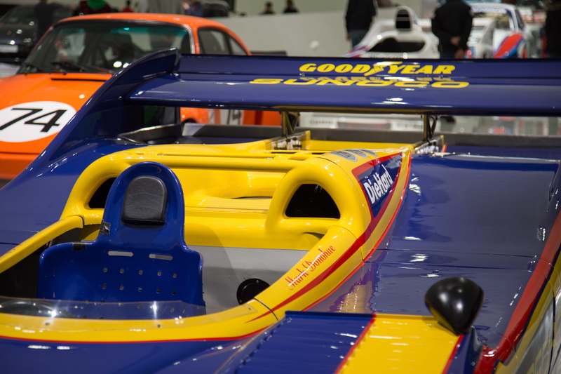 communication, day, absence, number, car wheel, car, race car, tire, focus on foreground, western script, text, machine, car show, coupe, mode of transportation