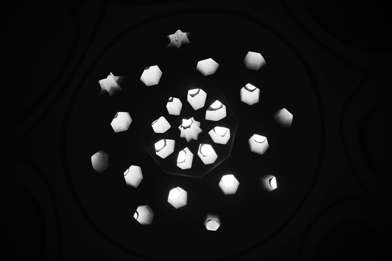 confectionery, snowflake, black and white, directly above, illuminated, popcorn, indoors, shape, no people, gemstone, assorted, pattern, shapes, recycling symbol