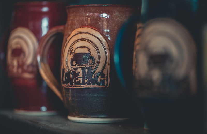 close-up, love mug, place of worship, coffee mug, drink, bottle, ancient, no people, selective focus, spirituality, hot, Volkswagen Beetle, building, focus on foreground