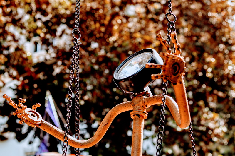 india, scale, 5K, sunny, outdoors, spiral, hanging, ankle, mumbai, high angle view, close-up, playground, gauge, no people, bicycle, day, coil, sphere