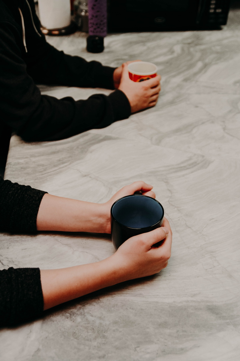 adult, holding, shoe, story, sitting, vegas, pick me up, neon, best friend, people, sweater, kitchen, la, day, focus on foreground, lifestyles, leisure activity