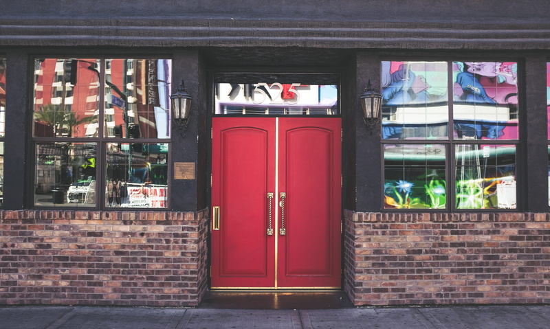 outdoors, transparent, day, building, red, telephone booth, communication, glass - material, united states, no people, architecture, las vegas, text, built structure