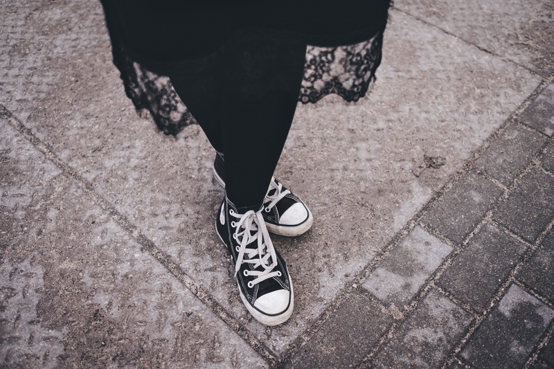 one person, top, road, urban, human leg, sneakers, paving stone, s, fashion, white, shoes, human body part, human foot, human limb, real people, lifestyles