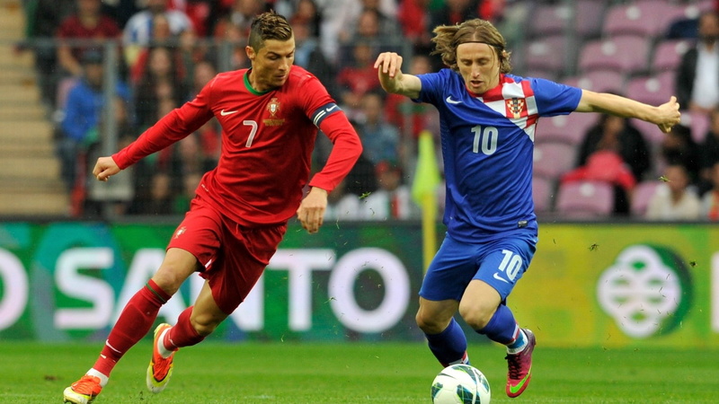 motion, running, two people, soccer ball, ball, grass, stadium, soccer player, playing, young adult, effort, athlete, sports clothing, team sport, soccer