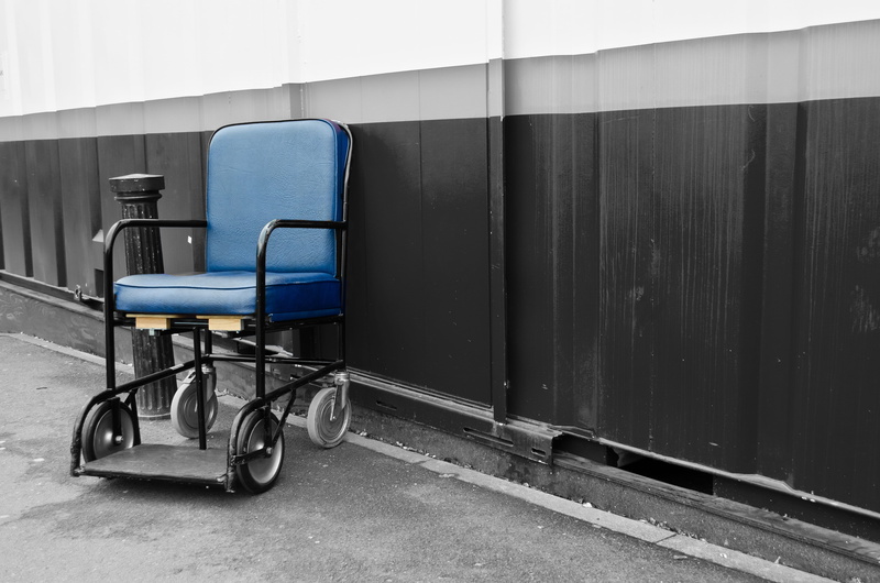 wall - building feature, architecture, equipment, symbol, empty, outdoors, no people, rail transportation, chair, patient, black, hospital, steel, building exterior
