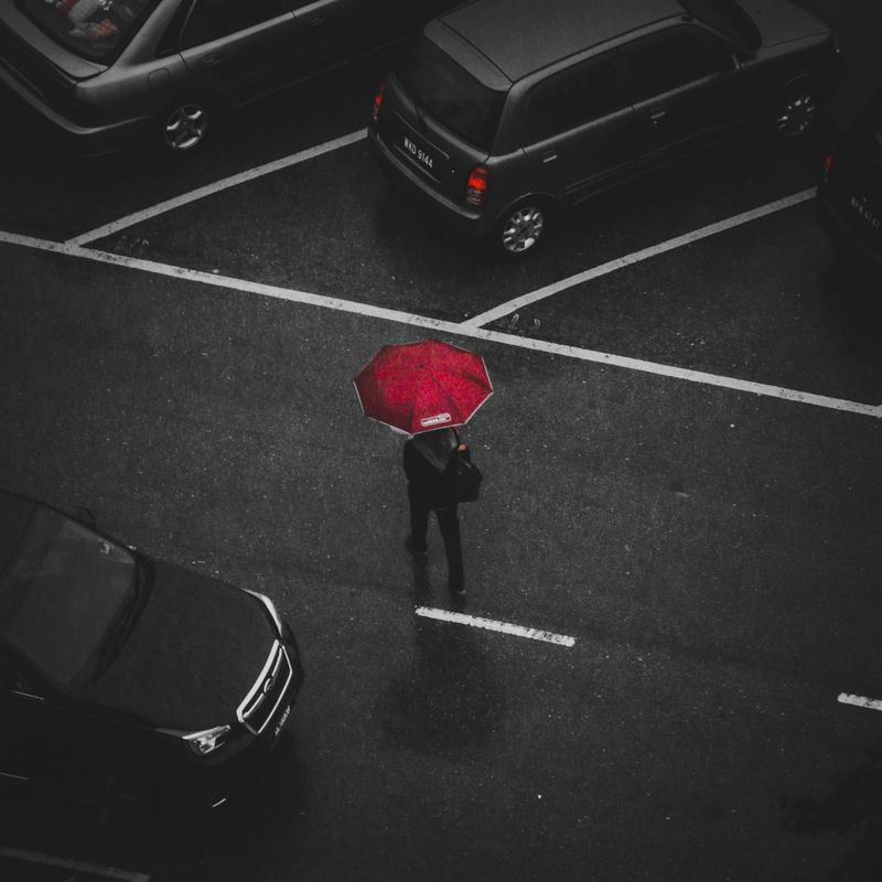 symbol, car, red, auto racing, real people, mode of transportation, high angle view, walking, holding, minimalism, action, road marking, person, 2K, automobile