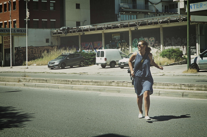 walking, transportation system, running, outdoors, automobile, day, building exterior, fashion, casual clothing, adult, travel, young women, young adult
