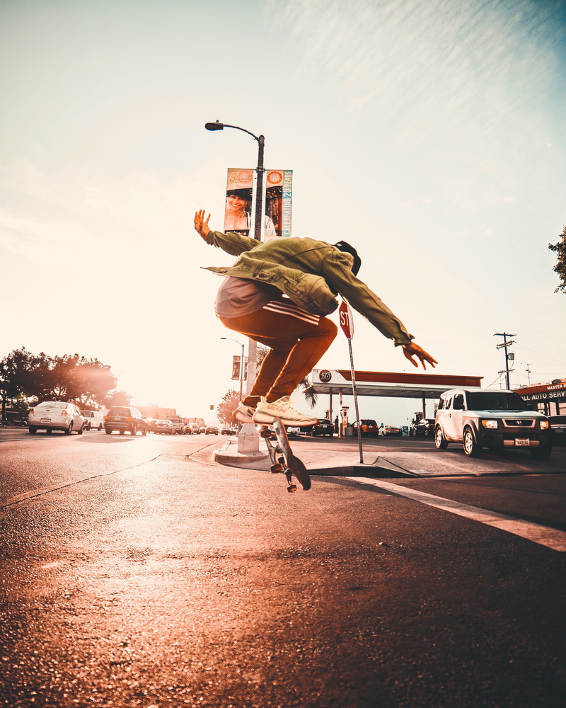 pedestrian, united states, mid-air, fairfax, architecture, tarmac, human arm, vitality, effort, one person, car, los angeles, lifestyles, nature, automobile