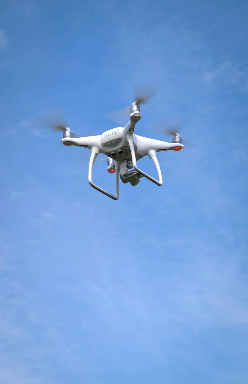 unmanned, motion, aircraft, sky, technology, low angle view, blue, plane, surveillance, sunlight, propeller, drone, innovation, camera, transportation