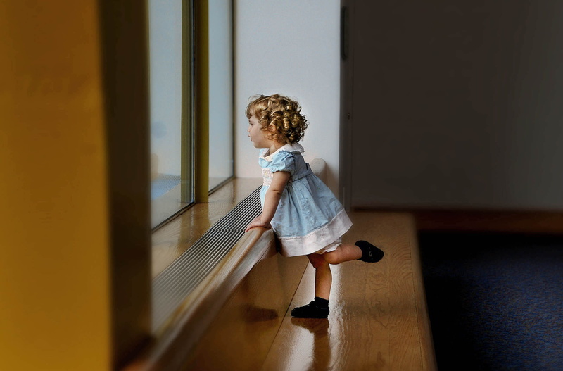 flooring, indoors, dress, hairstyle, pose, waiting, s, childhood, family, light, facial expression, happiness, kid, looking, girl, blond, face, day, beautiful