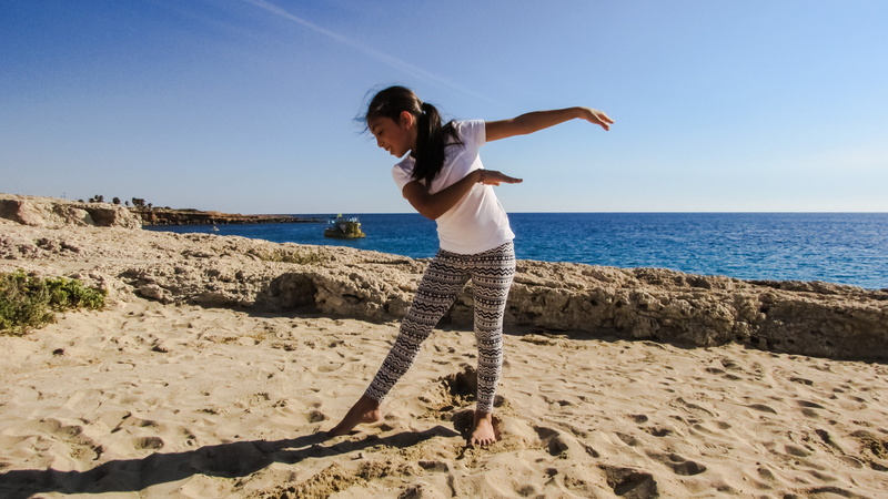 one woman only, Motion, full length, happy, sand, sunlight, kid, travel Locations, lifestyle, Beach, lifestyles, child, women, sea, outdoors, day, adults only