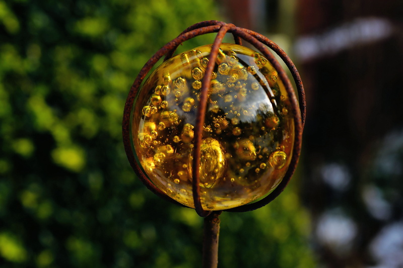 color, mirroring, focus on foreground, sphere, background, ornament, outdoors, shape, magnifying glass, glass ball, plant, art, winter, tree, circle, marble