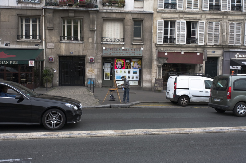 stationary, day, city, communication, residential district, street, mode of transportation, built structure, street artist - quartier latin, building exterior