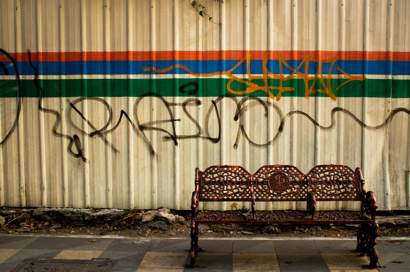 wall, empty, multi colored, seat, communication, pattern, architecture, text, iron, jalan mayjen sungkono, art and craft, absence, graffiti, building exterior