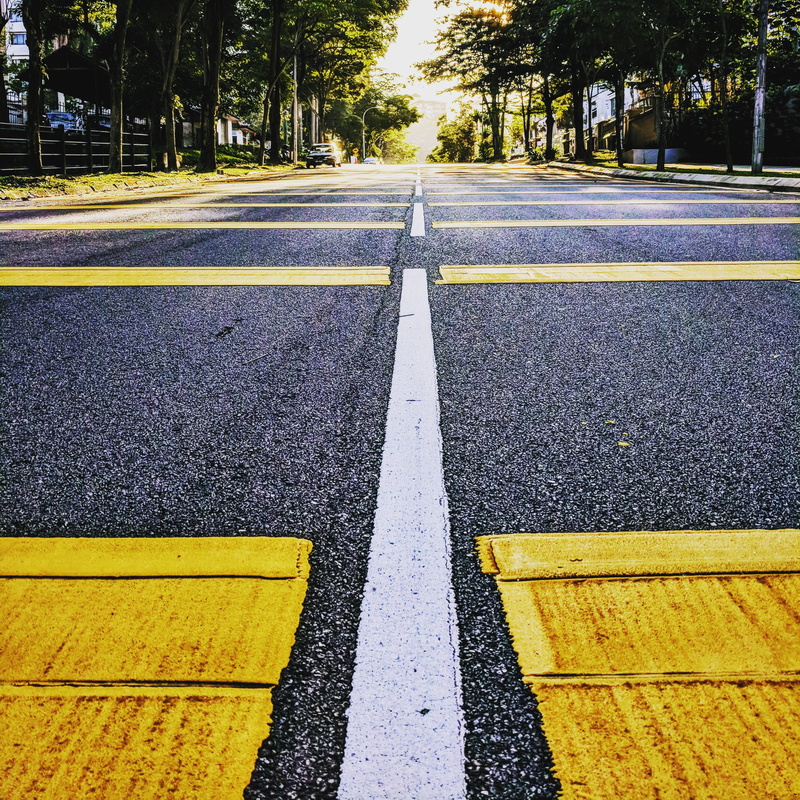 outdoors, diminishing perspective, yellow, tree, surface level, road marking, the way forward, guidance, street, 2K, roadside, travel, symbol, double yellow line