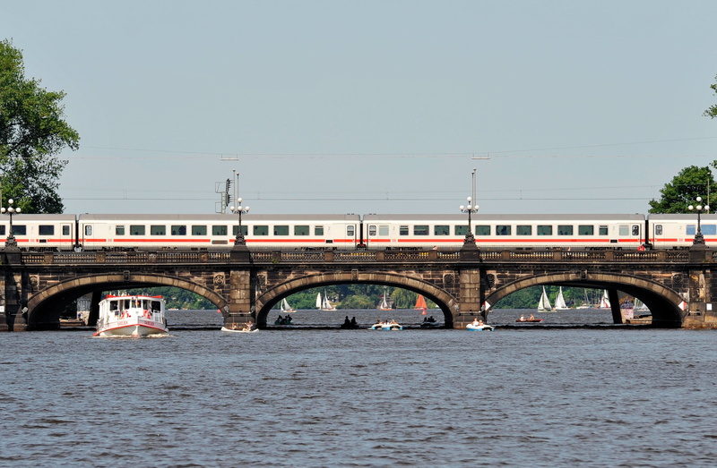 built structure, clear sky, alster waterway, day, arch bridge, spring, bridge - man made structure, nature, mode of transportation, hanseatic city, river