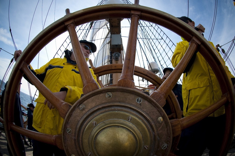 eagle, men, water, steering, boat, 1080P, nautical vessel, day, two, sea, ship, overalls, adult, outdoors, near, architecture, vessel, yellow, training