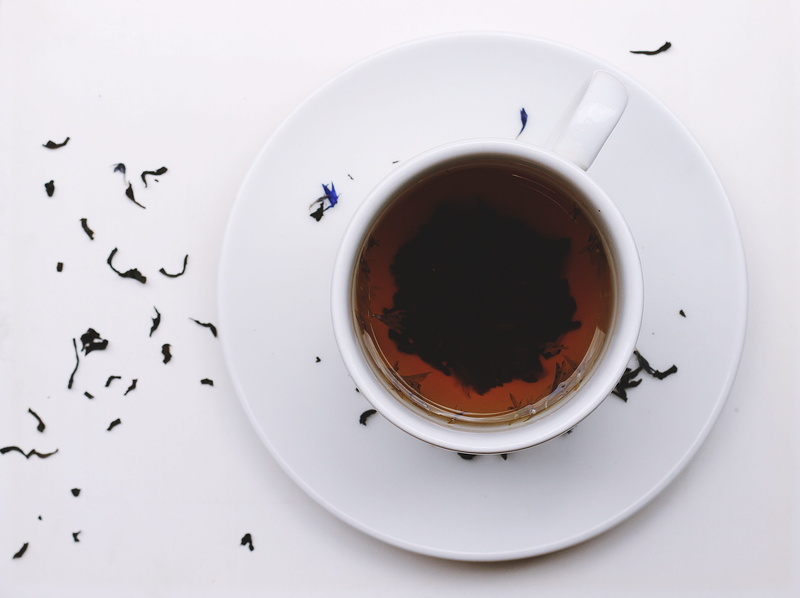 drink, coffee cup, crockery, saucer, indoors, cup, black tea, paper, studio shot, brown, black, coffee - drink, white, food and drink, directly above, tea - hot drink