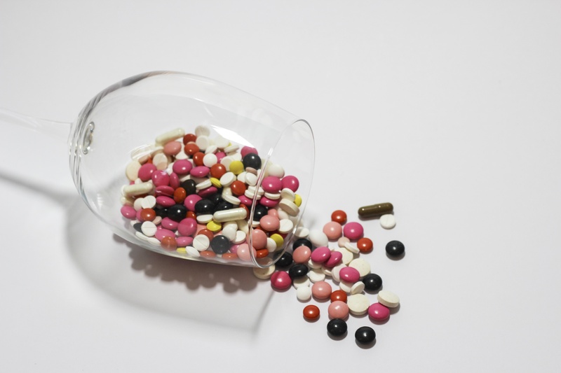 variation, medications, the pill, medical, studio shot, science, choice, pouring, large group of objects, solution, dose, glass, still life, nutritional supplement