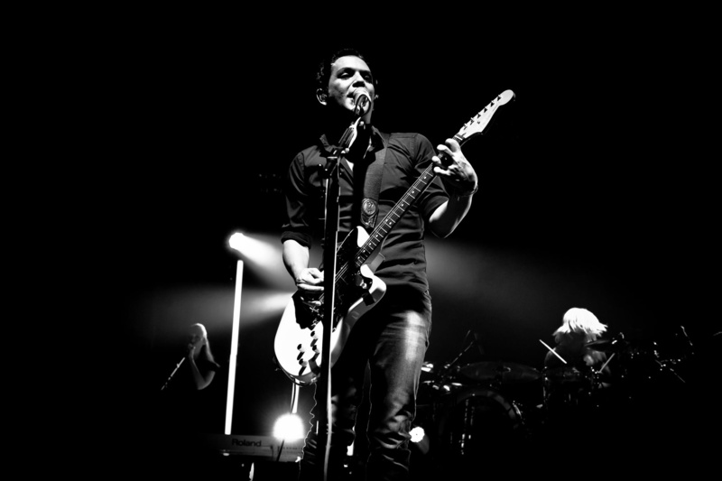 black Background, entertainment occupation, grayscale, shirt, artist, illuminated, performer, arts culture and entertainment, input device, performance