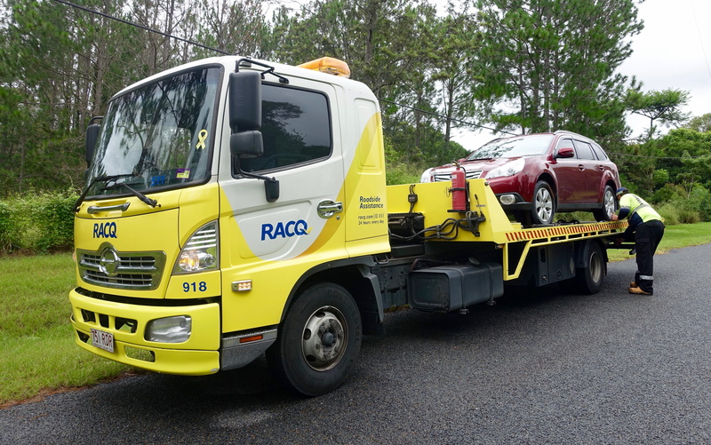 no people, breakdown, car, repair, service, tree, street, recovery, auto, outdoors, yellow, motor vehicle, day, stationary, number, emergency, maintenance