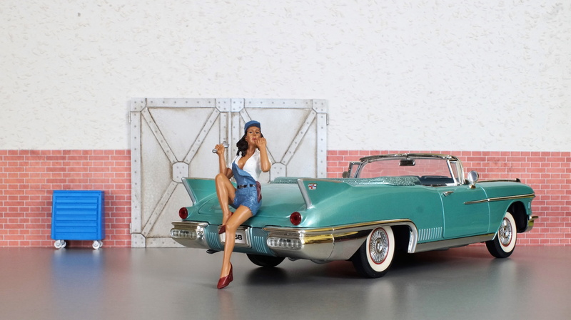 one person, america, model, day, confidence, cadillac, portrait, standing, model car, copy space, indoors, young adult, only women, full length, usa, vehicle