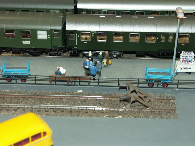 competition, platform, real people, model railway, high angle view, lifestyles, men, sport, road, mode of transportation, railway station, transportation