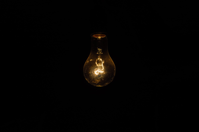 close-up, light, filament, idea, fuel and power generation, power supply, no people, illuminated, copy space, black background, glass - material, still life