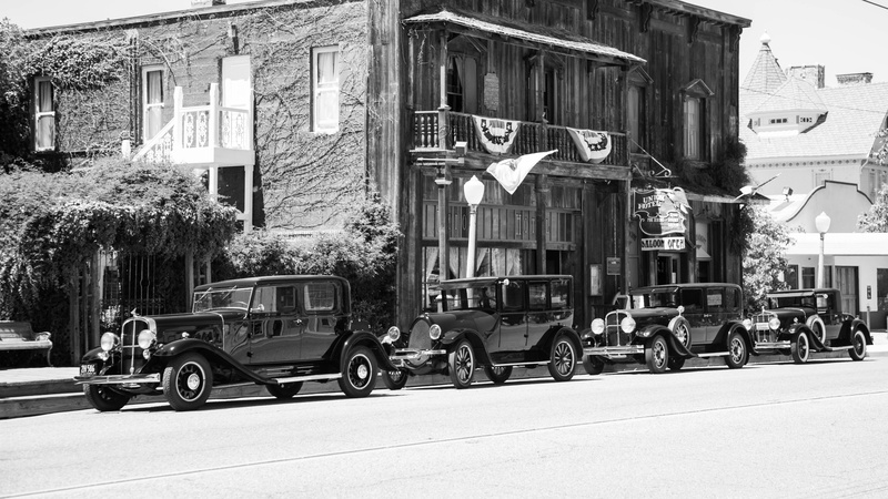 vintage cars, day, building exterior, transportation, united states, street, women, tree, incidental people, road, mode of transportation, motor vehicle