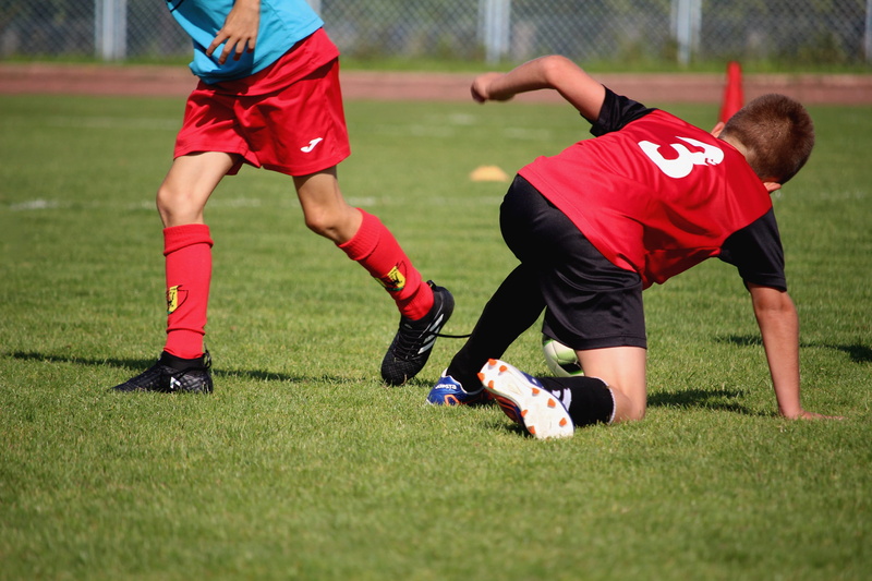 team, orlik, grass, day, athlete, sparring, children, soccer uniform, sport, game, league, effort, goal, motion, player, boy, outdoors, sports uniform