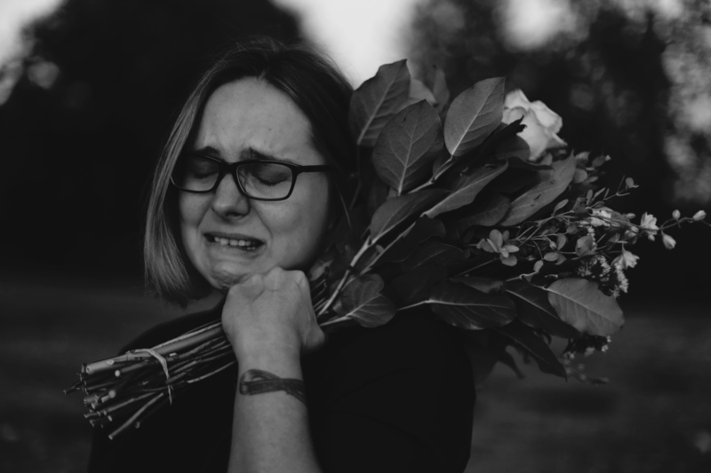 cancer tattoo, holding flowers, lifestyles, sunset, young Adult, happiness, disappointment, human Face, one Person, beauty, woman, day, black And White