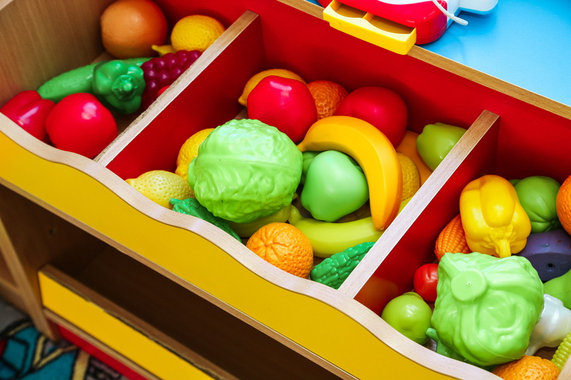 still life, candy, lunch box, gmo, high angle view, freshness, vegetables, no people, large group of objects, toy, vegetarian, vegetable, indoors, food and drink