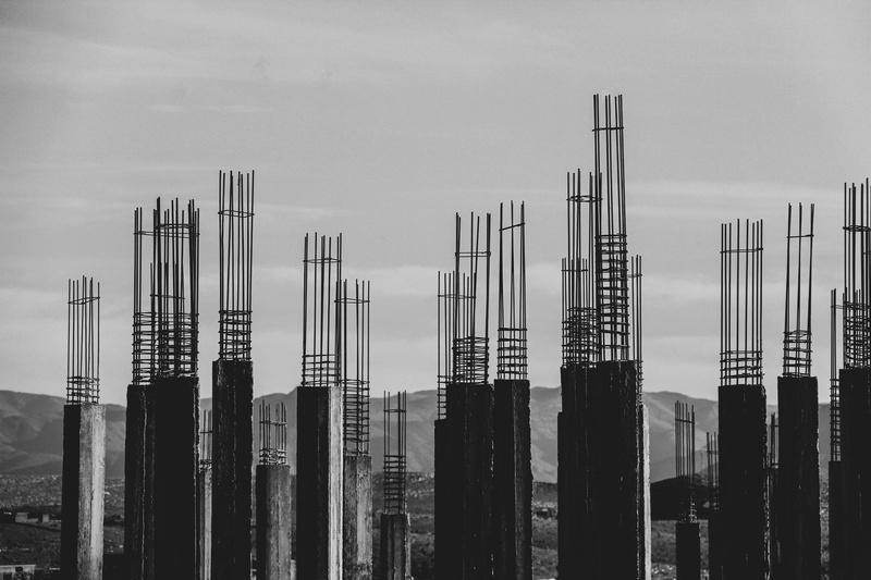posts, day, tower, financial district, no people, black, nature, city, factory, housing, high rise, urban, outdoors, office building, urban skyline, built structure
