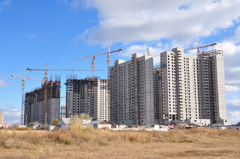 built structure, crane - construction machinery, machinery, kazakhstan, office building exterior, skyscraper, city, no people, incomplete, industry, building exterior