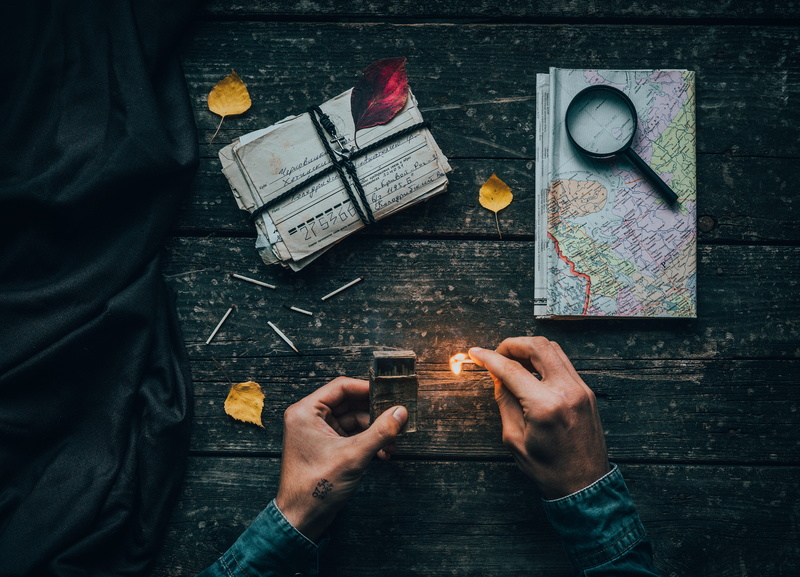 creativity, paper, glass, holding, travel, denim, close-up, match, celebration, table, old-fashioned, lighted, flame, men, old, hand, hands, person, map