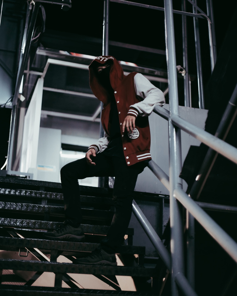 young adult, steps and staircases, man, healthy lifestyle, men, jacket, real people, button, wearing, built structure, gray, lifestyles, railing, exercising