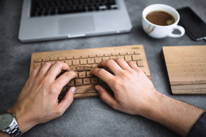 man, Young, using laptop, drink, 4K, wooden keyboard, people, cup, workspace, computer, computer Keyboard, one Person, hand, business, coffee cup, table