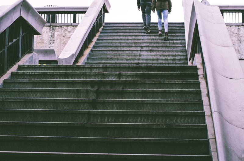 building, steps and staircases, low angle view, stairs, climbing, the way forward, urban, europe, day, direction, real people, moving up, outdoors, life