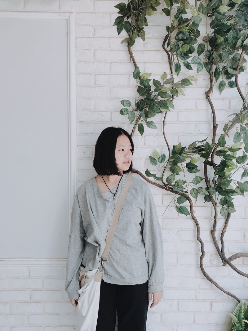leisure activity, near, hairstyle, one person, plant part, front view, banister, woman, standing, handrail, fashion, clothing, real people, human, beautiful woman