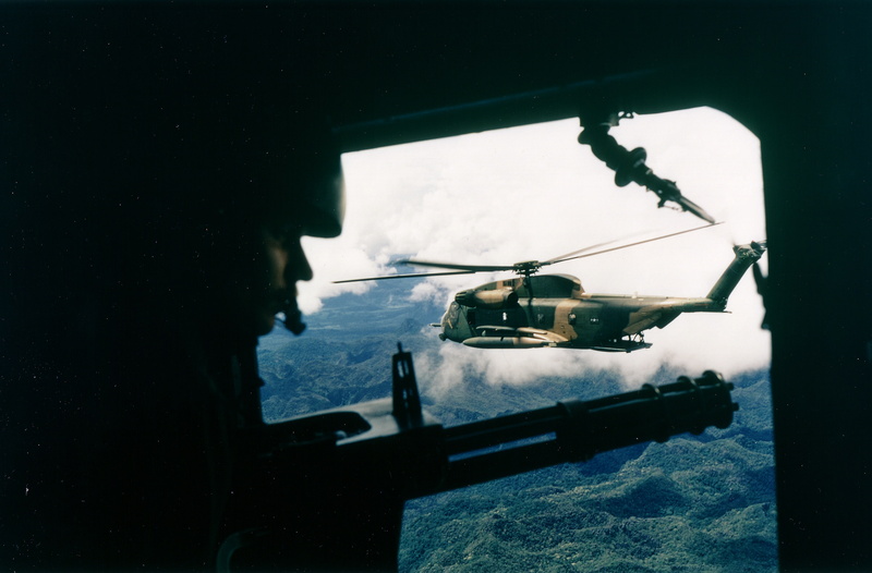 black, transportation, helicopter, sky, car, vehicle interior, nature, military, reflection, mode of transportation, glass - material, gun, windshield