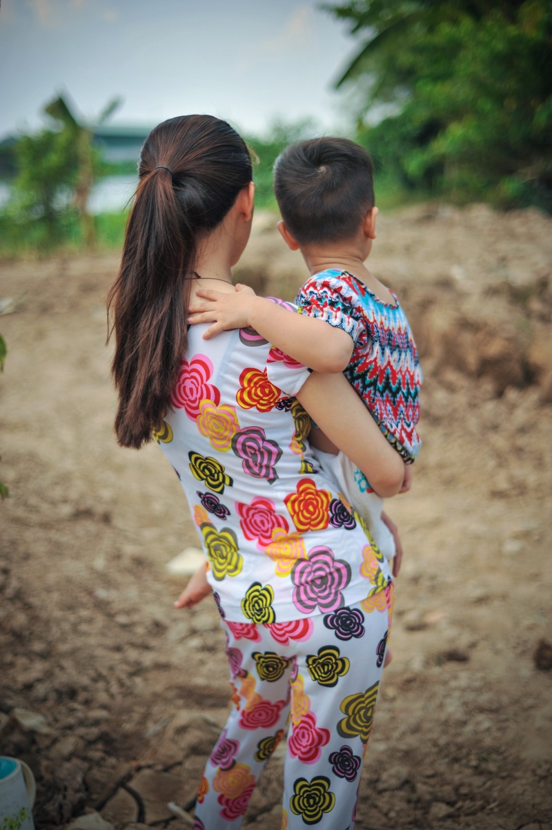 childhood, family, love, outdoors, two people, standing, women, looking, real people, three quarter length, person, together, rear view, innocence, land